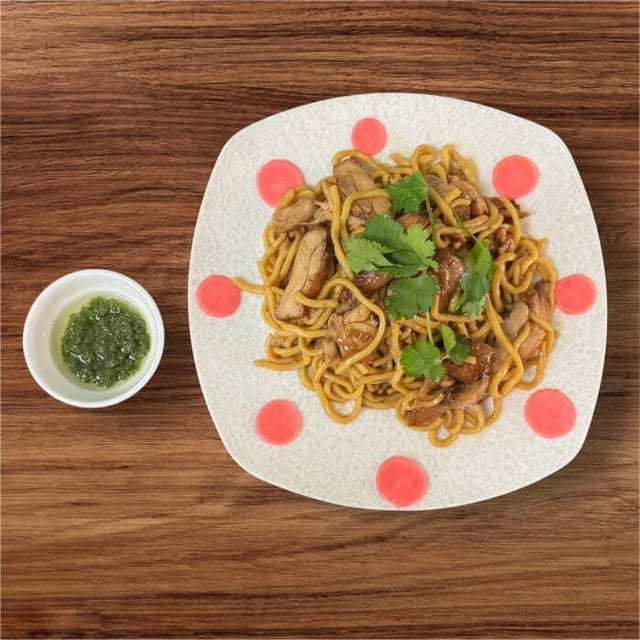 House Garlic Noodle with Grilled Chicken.
